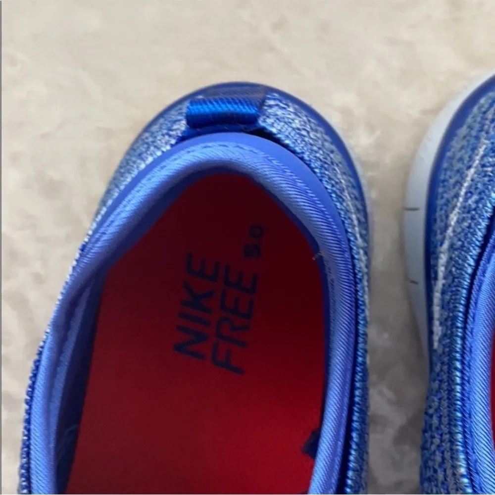 Nike women’s TR flyknit blue/white sneakers